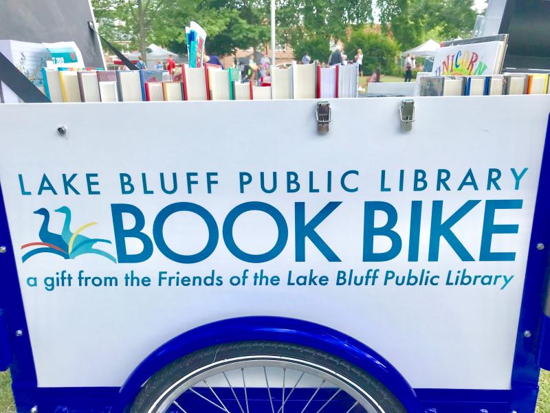 The Library Book Bike artwork. Reads Lake Bluff Library Book Bike, a gift from the Friends of the Library.